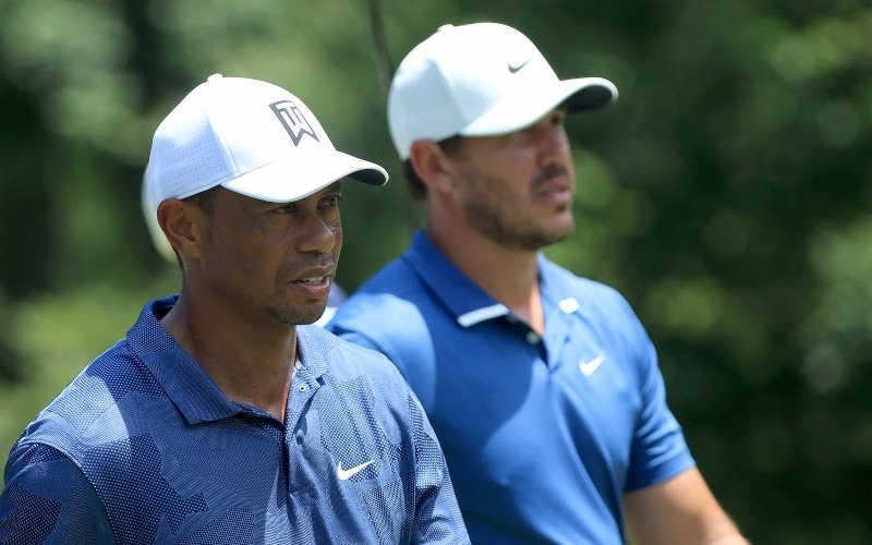 woods-koepka Tiger Woods of the United States and Brooks Koepka of the United States walk from the ninth tee during the second round of The Memorial Tournament on July 17, 2020 at Muirfield Village Golf Club in Dublin, Ohio. (Photo by Sam Greenwood/Getty Images)