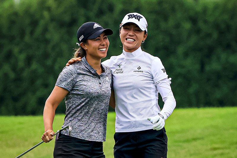 kang-ko-team-event-feature Danielle Kang (L) and Lydia Ko celebrate an eagle on the 11th hole during the second round of the Dow Great Lakes Bay Invitational at Midland Country Club in Midland, Michigan. (Photo by Sam Greenwood/Getty Images)